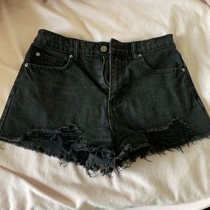 Ripped black denim shorts